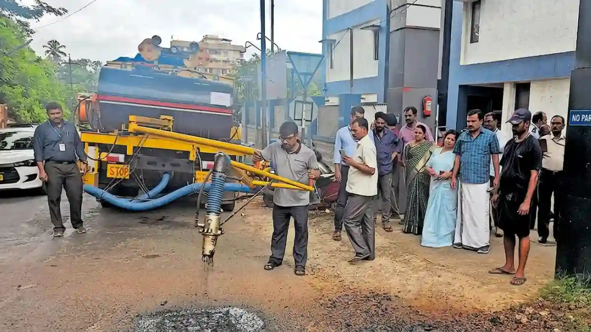 മഴക്കാലത്തും റോഡ് ടാർ, തൃശൂർ കോർപ്പറേഷൻ വാർത്തകൾ, റോഡ് റീപ്പയറിങ് മെഷീൻ, ഡെപ്യൂട്ടി മേയർ എ പ്രസാദ്, ഒ ആർ കേളു മന്ത്രി